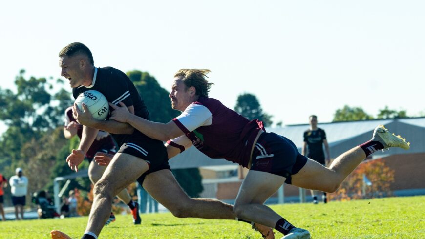 Cormac McAnallens and Clan na Gael men's footballers during the 2024 New South Wales league final.