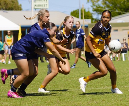 Gaelic Games Junior Academy of WA and Young Melbourne girls playing at the 2025 Australasia Féile in Perth.
